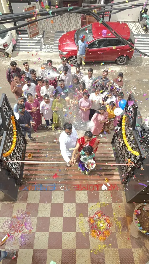 Emblix Solutions team celebrating at the office entrance